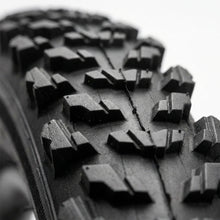 Load image into Gallery viewer, Close-up of the Raider MTB tyre tread pattern on a 26 x 1.75 mountain bike tyre.
Copy image titleCopy alt text
