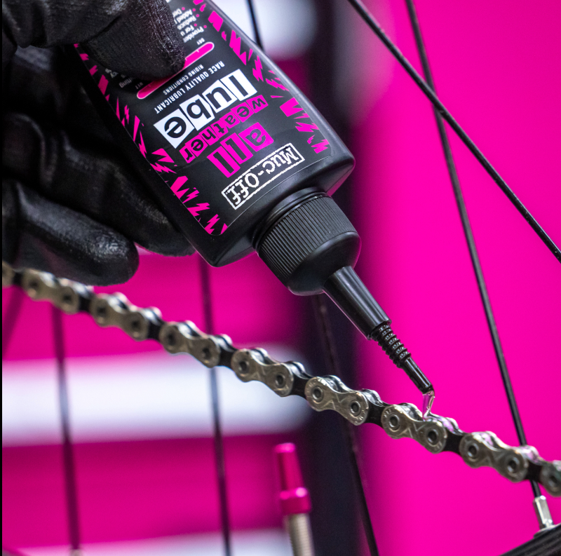 Muc-Off All Weather Lube (50ml) chain application close up