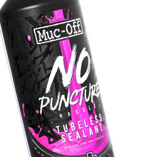 Load image into Gallery viewer, Muc-Off No Puncture Hassle Tubeless Sealant (1 Litre) close up