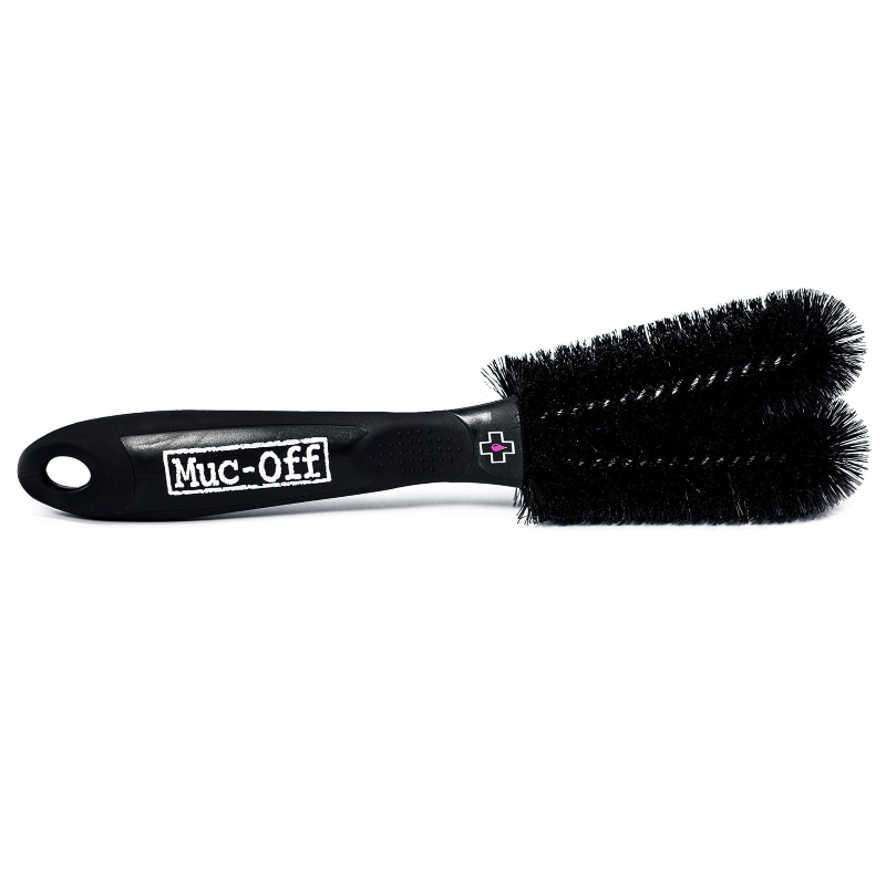 Muc-Off Premium Two Prong Brush on it;s side